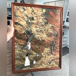 Spooky acrylic painting with ghosts.